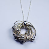 14 Rings with Beads Silver Pendant