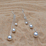 Triple Ball Pendulum Earrings